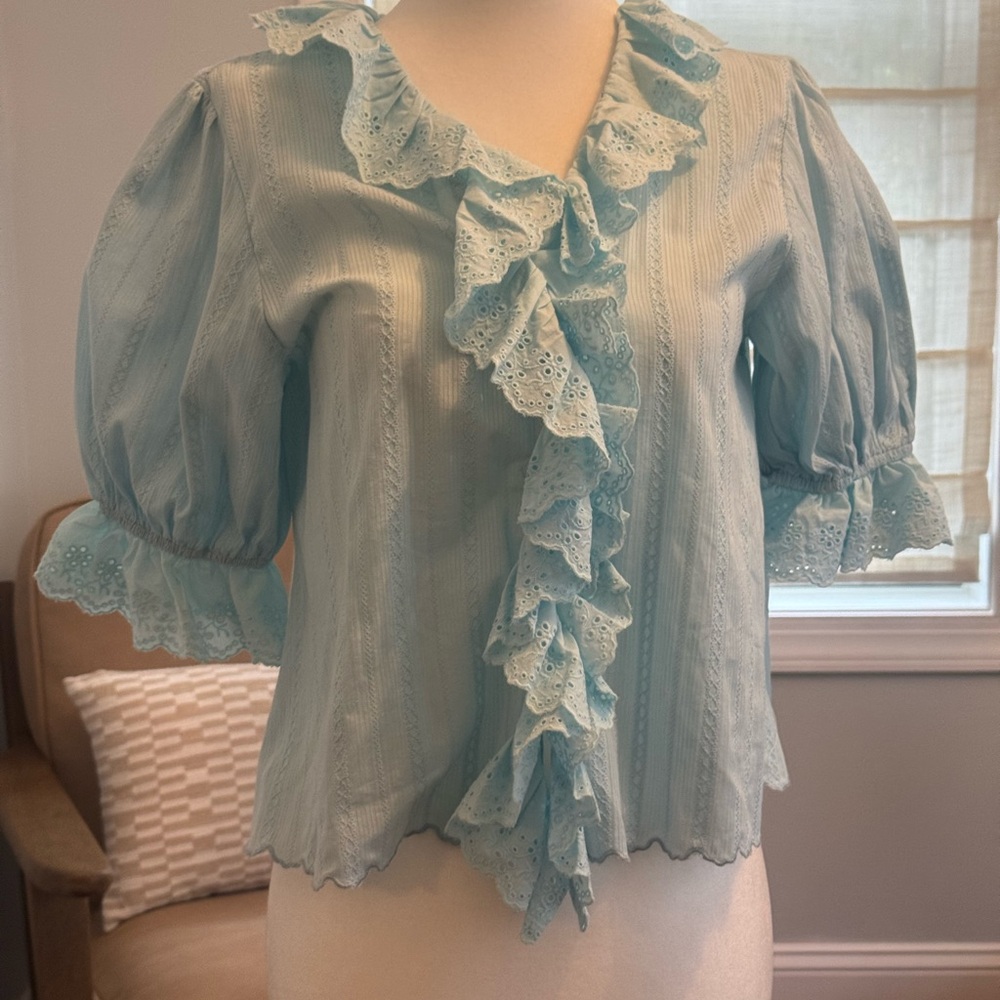 Elegant Ruffled Blouse in Soft Blue